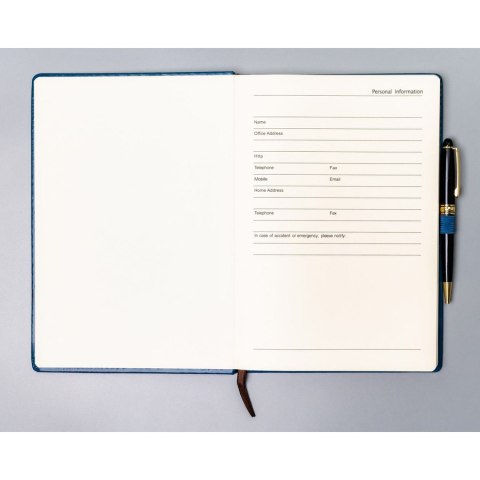 Niebieski notes w twardej oprawie formacie B5 zadrukowany w kropki - Peterson